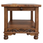Handcrafted end table with hand-hammered copper top, floral carvings, and bun feet. The DuPont End Table blends Western character with timeless, artisanal craftsmanship.
