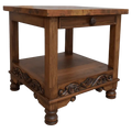 Handcrafted end table with hand-hammered copper top, floral carvings, and bun feet. The DuPont End Table blends Western character with timeless, artisanal craftsmanship.