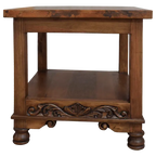 Handcrafted end table with hand-hammered copper top, floral carvings, and bun feet. The DuPont End Table blends Western character with timeless, artisanal craftsmanship.