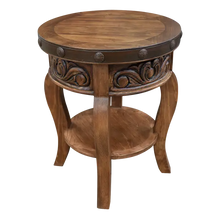 Load image into Gallery viewer, Handcrafted round end table with carved floral base, hammered copper rim, and iron conchos. The Drum End Table blends rustic artistry with refined Western craftsmanship.