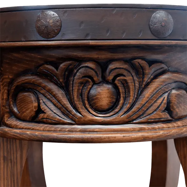 Handcrafted round end table with carved floral base, hammered copper rim, and iron conchos. The Drum End Table blends rustic artistry with refined Western craftsmanship.