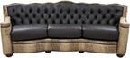Black leather tufted western cowhide sofa with wicker armrests on a white background