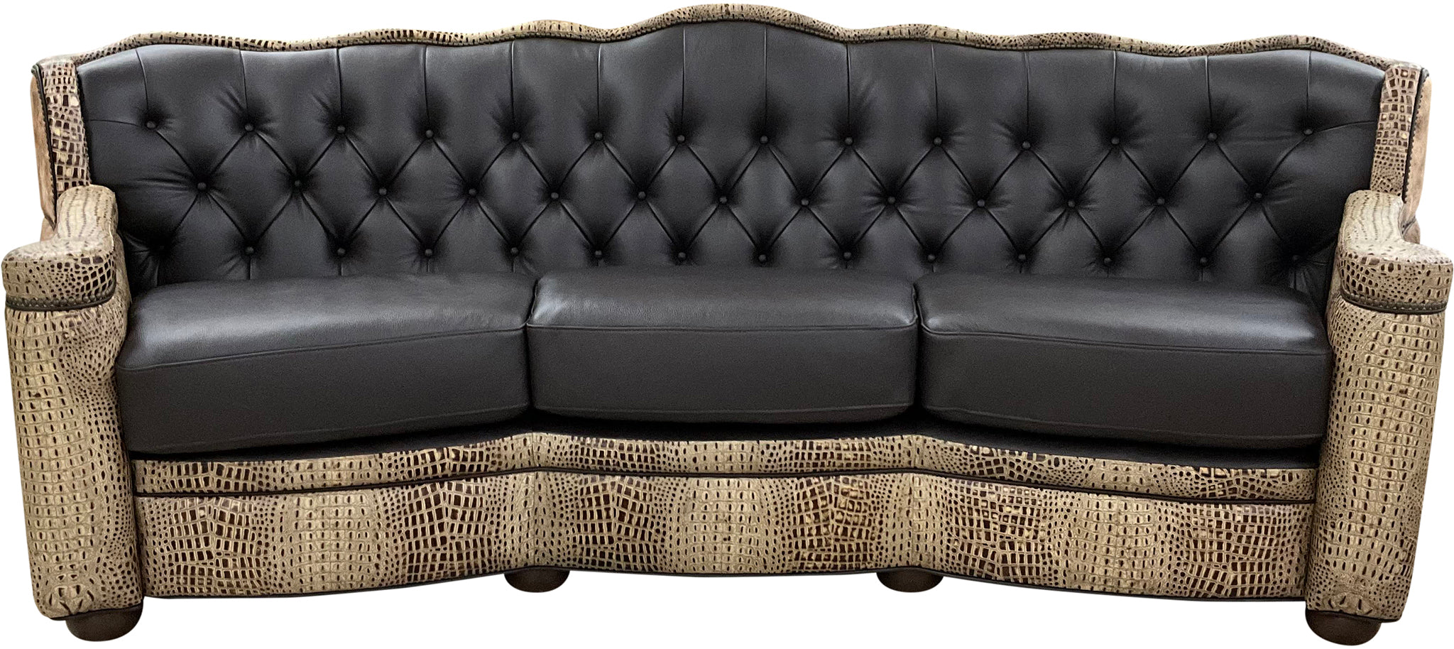 Black leather tufted western cowhide sofa with wicker armrests on a white background