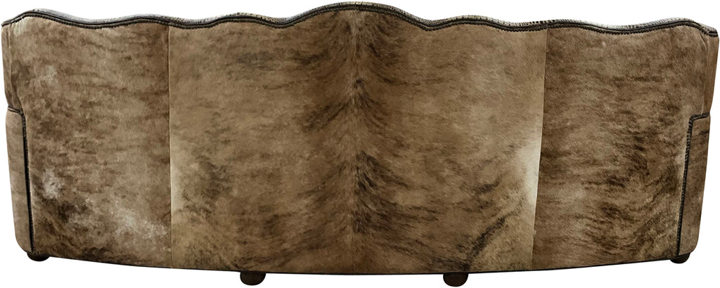Brown leather sofa with scalloped edge design