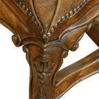 The Matador Dining Chair combines embossed full-grain leather, hand-carved hardwood, and Spanish Colonial artistry. A luxurious Western dining chair handcrafted for beauty, comfort, and endurance. Fully customizable and guaranteed for life.