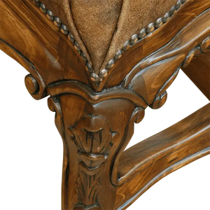 The Matador Dining Chair combines embossed full-grain leather, hand-carved hardwood, and Spanish Colonial artistry. A luxurious Western dining chair handcrafted for beauty, comfort, and endurance. Fully customizable and guaranteed for life.