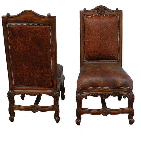 The Matador Dining Chair combines embossed full-grain leather, hand-carved hardwood, and Spanish Colonial artistry. A luxurious Western dining chair handcrafted for beauty, comfort, and endurance. Fully customizable and guaranteed for life.