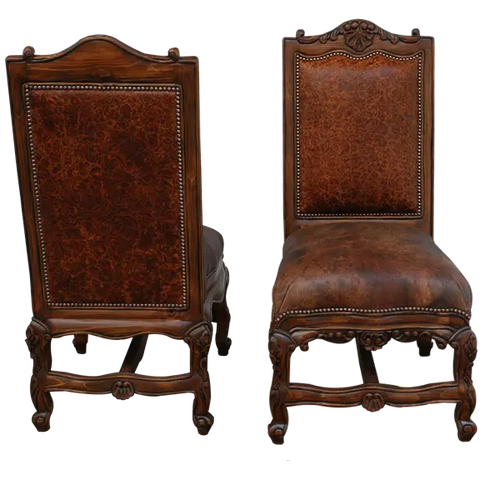 The Matador Dining Chair combines embossed full-grain leather, hand-carved hardwood, and Spanish Colonial artistry. A luxurious Western dining chair handcrafted for beauty, comfort, and endurance. Fully customizable and guaranteed for life.