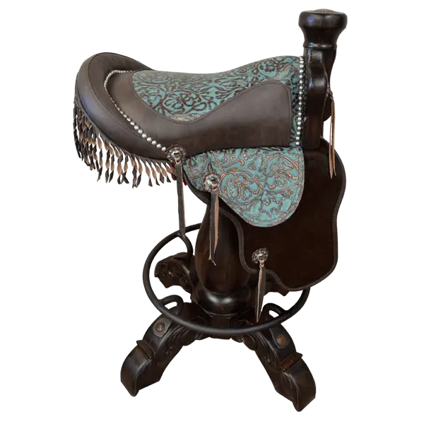 The Mustang Saddle Barstool features embossed turquoise leather, full-grain leather panels, and a hand-forged medallion on a 180° swivel wood base. A handcrafted Western saddle barstool celebrating the artistry and heritage of the American West.