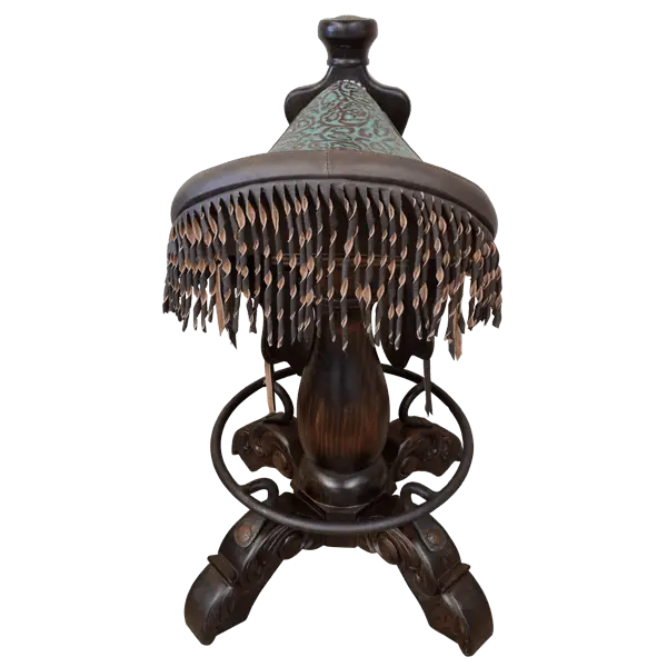 The Mustang Saddle Barstool features embossed turquoise leather, full-grain leather panels, and a hand-forged medallion on a 180° swivel wood base. A handcrafted Western saddle barstool celebrating the artistry and heritage of the American West.