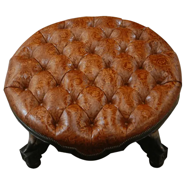 Handcrafted Western ottoman with hand-tooled leather, deep tufting, and carved wood base. The Dominante Ottoman blends rustic elegance with timeless craftsmanship. Customizable.