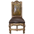 The Picador Dining Chair features full-grain leather upholstery, embossed floral detailing, and hand-carved hardwood. A Spanish Colonial-inspired dining chair blending Western luxury with artisanal craftsmanship. 100% customizable and guaranteed for life.