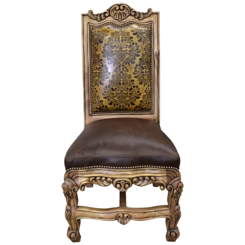 The Picador Dining Chair features full-grain leather upholstery, embossed floral detailing, and hand-carved hardwood. A Spanish Colonial-inspired dining chair blending Western luxury with artisanal craftsmanship. 100% customizable and guaranteed for life.