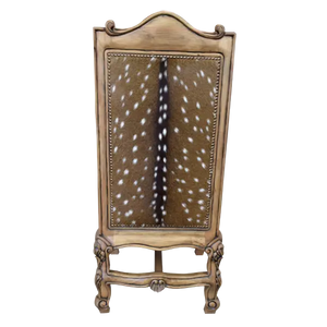 The Picador Dining Chair features full-grain leather upholstery, embossed floral detailing, and hand-carved hardwood. A Spanish Colonial-inspired dining chair blending Western luxury with artisanal craftsmanship. 100% customizable and guaranteed for life.