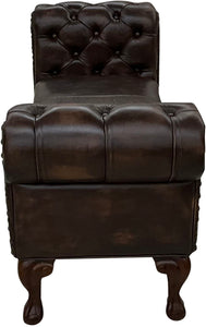 Dark brown leather chestefield bench with tufted roll arms and crocodile accent leather saddle insert