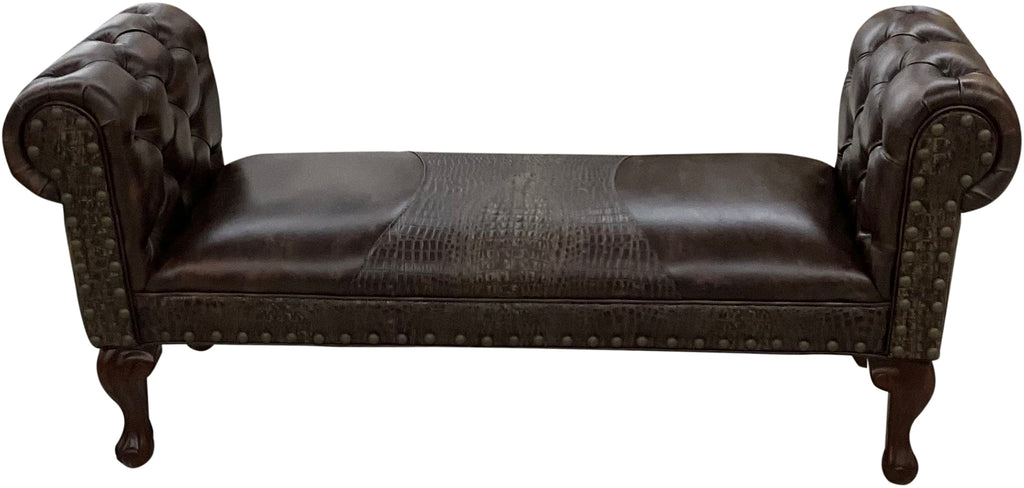 Dark brown leather chestefield bench with tufted roll arms and crocodile accent leather saddle insert