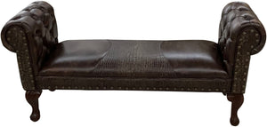 Dark brown leather chestefield bench with tufted roll arms and crocodile accent leather saddle insert