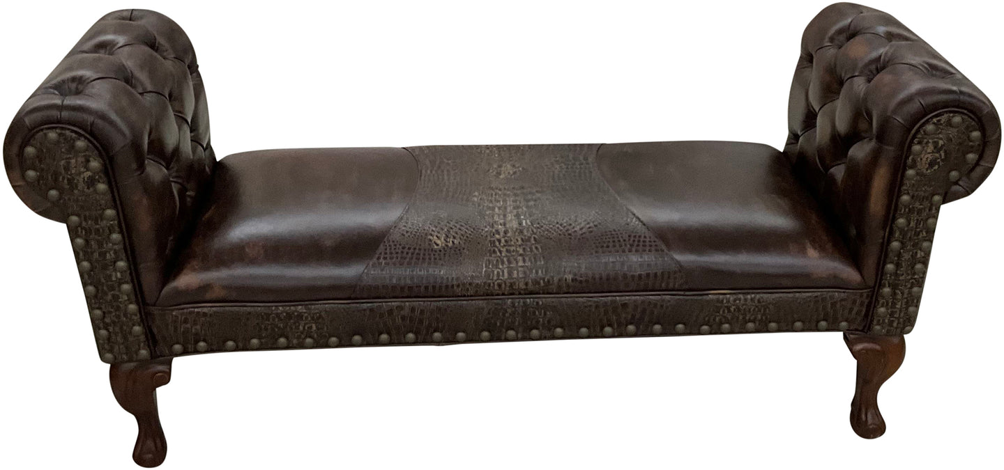 Dark brown leather chestefield bench with tufted roll arms and crocodile accent leather saddle insert