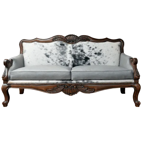 Handcrafted Western-style sofa with carved wood frame, full-grain leather, and cowhide upholstery. The Lords Sofa blends rustic charm with elegant Spanish Colonial design. Fully Customizable.