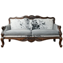 Load image into Gallery viewer, Handcrafted Western-style sofa with carved wood frame, full-grain leather, and cowhide upholstery. The Lords Sofa blends rustic charm with elegant Spanish Colonial design. Fully Customizable.