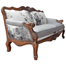 Load image into Gallery viewer, Handcrafted Western-style sofa with carved wood frame, full-grain leather, and cowhide upholstery. The Lords Sofa blends rustic charm with elegant Spanish Colonial design. Fully Customizable.