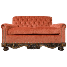 Load image into Gallery viewer, Handcrafted Western loveseat with carved wood base, rust-toned fabric, and tufted backrest. The Durango Loveseat blends rustic warmth with refined craftsmanship. Customizable.