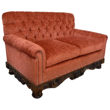 Load image into Gallery viewer, Handcrafted Western loveseat with carved wood base, rust-toned fabric, and tufted backrest. The Durango Loveseat blends rustic warmth with refined craftsmanship. Customizable.