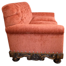 Load image into Gallery viewer, Handcrafted Western loveseat with carved wood base, rust-toned fabric, and tufted backrest. The Durango Loveseat blends rustic warmth with refined craftsmanship. Customizable.