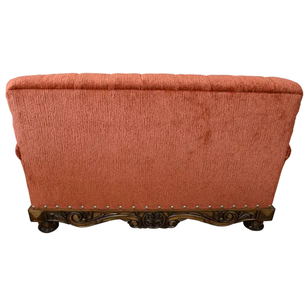 Handcrafted Western loveseat with carved wood base, rust-toned fabric, and tufted backrest. The Durango Loveseat blends rustic warmth with refined craftsmanship. Customizable.