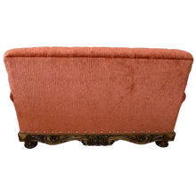 Load image into Gallery viewer, Handcrafted Western loveseat with carved wood base, rust-toned fabric, and tufted backrest. The Durango Loveseat blends rustic warmth with refined craftsmanship. Customizable.