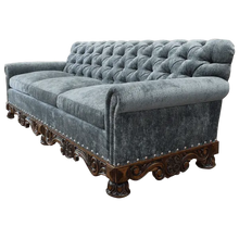 Load image into Gallery viewer, Handcrafted Western-style sofa with deep tufting, carved wood base, and customizable upholstery. The Hidalgo Sofa blends rustic elegance with heirloom craftsmanship.