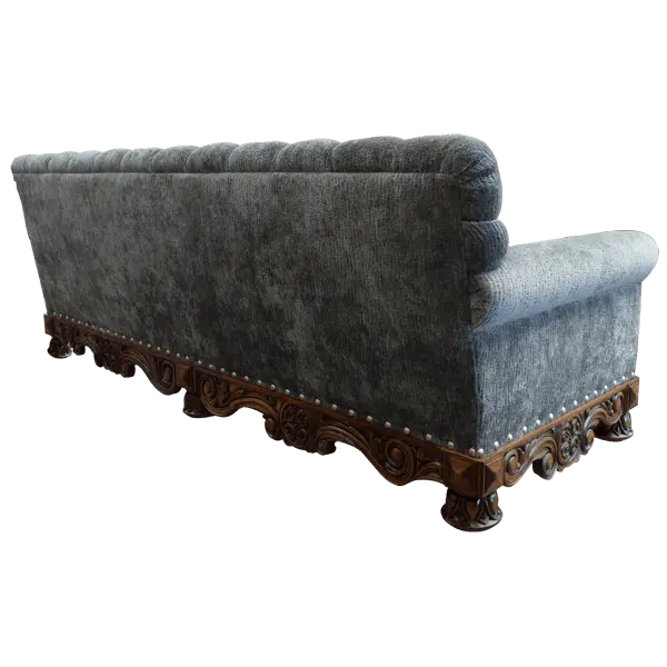 Handcrafted Western-style sofa with deep tufting, carved wood base, and customizable upholstery. The Hidalgo Sofa blends rustic elegance with heirloom craftsmanship.