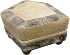 Hexagonal ottoman with textured beige top and patterned base on a white background, called palomino theater ottoman