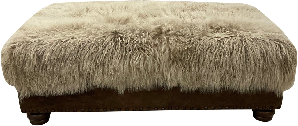 Luxury Tibetan sheep champagne storage ottoman with plush long-hair sheepskin top, leather base, nailhead trim, and hidden storage. Western lodge accent ottoman 36" x 60".