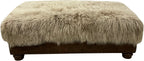 Luxury Tibetan sheep champagne storage ottoman with plush long-hair sheepskin top, leather base, nailhead trim, and hidden storage. Western lodge accent ottoman 36" x 60".