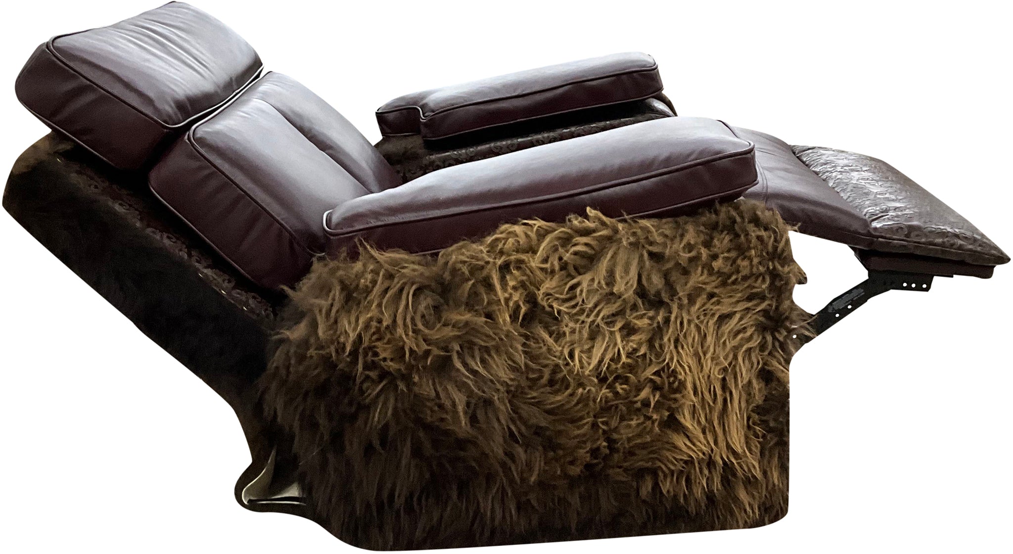 Luxury Western rocker recliner in Fellside Mulberry leather with Lindt Mocha accents and full bison hide wrap. A bold Yellowstone-inspired recliner blending rugged texture with heirloom craftsmanship.