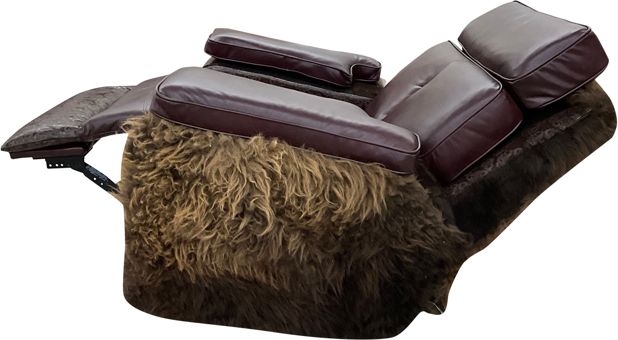 Luxury Western rocker recliner in Fellside Mulberry leather with Lindt Mocha accents and full bison hide wrap. A bold Yellowstone-inspired recliner blending rugged texture with heirloom craftsmanship.