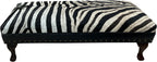 Luxury zebra hide bench with authentic zebra hide seat, Fendi Night leather rail, nailhead trim, and traditional ball-and-claw wood frame. Exotic statement bench 60".