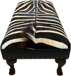 Luxury zebra hide bench with authentic zebra hide seat, Fendi Night leather rail, nailhead trim, and traditional ball-and-claw wood frame. Exotic statement bench 60".