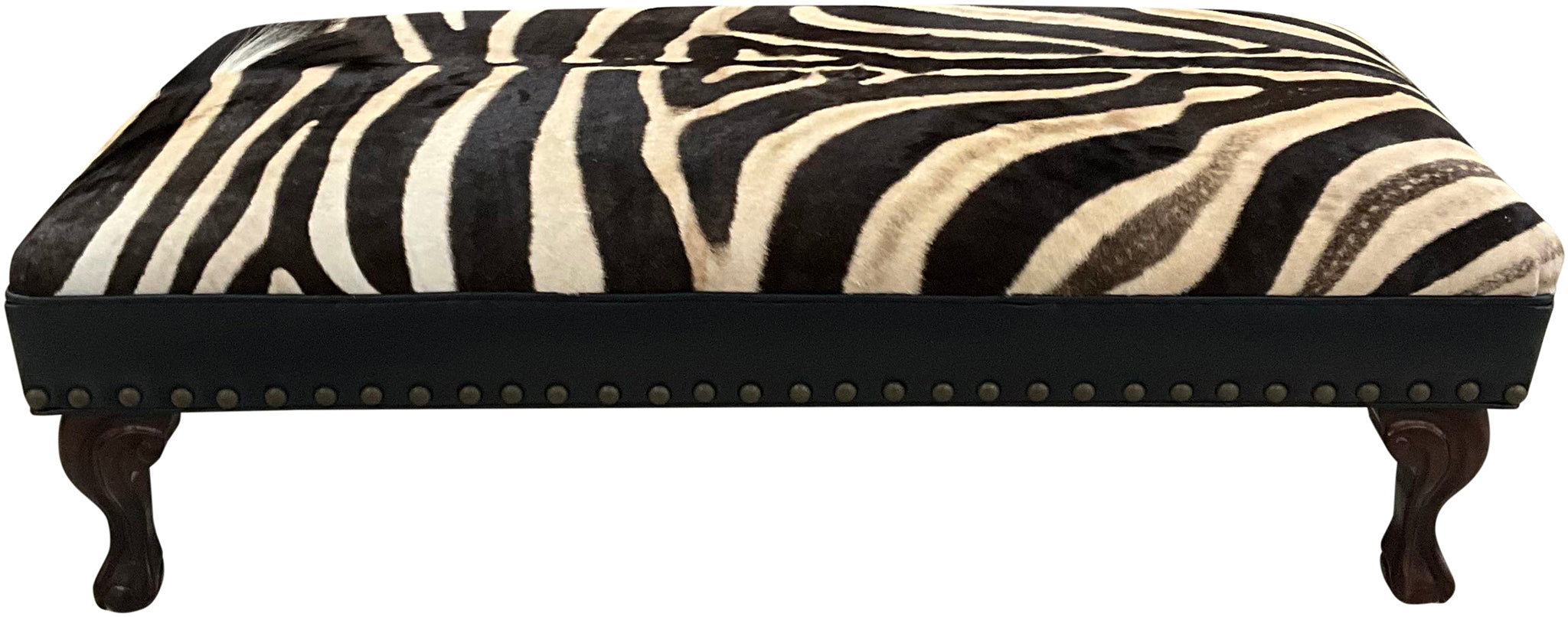 Luxury zebra hide bench with authentic zebra hide seat, Fendi Night leather rail, nailhead trim, and traditional ball-and-claw wood frame. Exotic statement bench 60".
